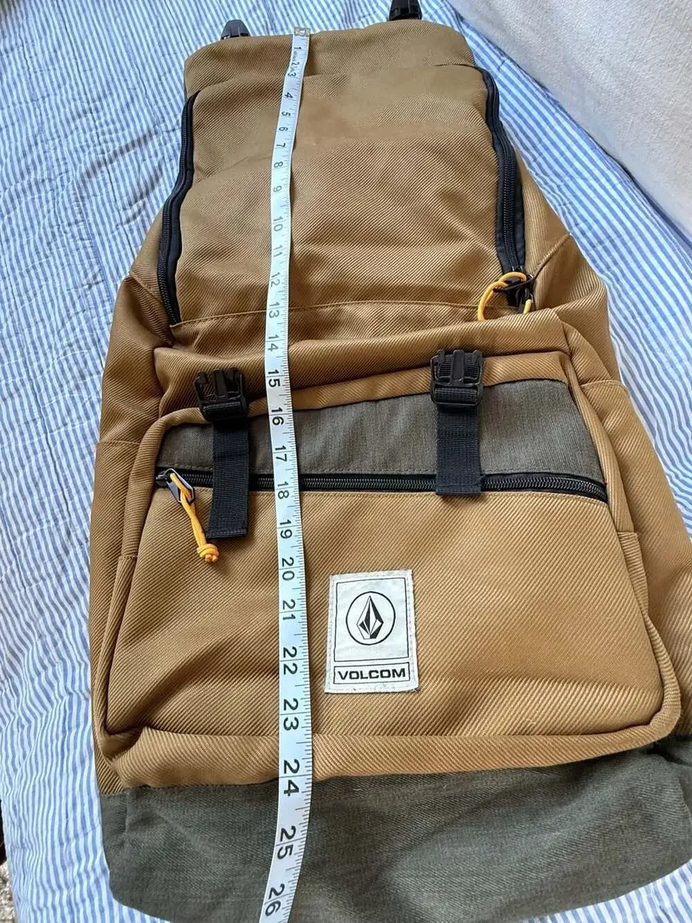 Volcom Brown and Green Flap Backpack with Buckle Straps excellent condition.